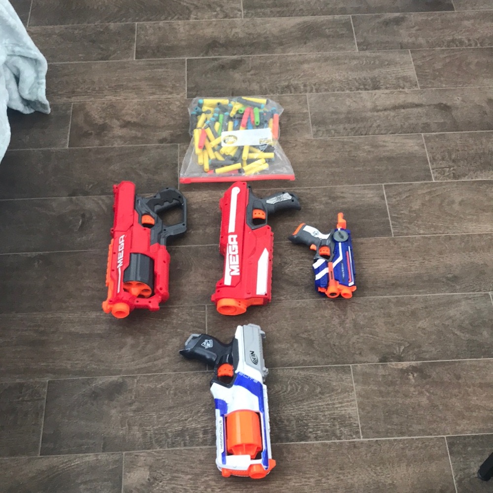 2 mega nerf guns,1 strongarm nerf gun,and a firestrike nerf gun with some darts.